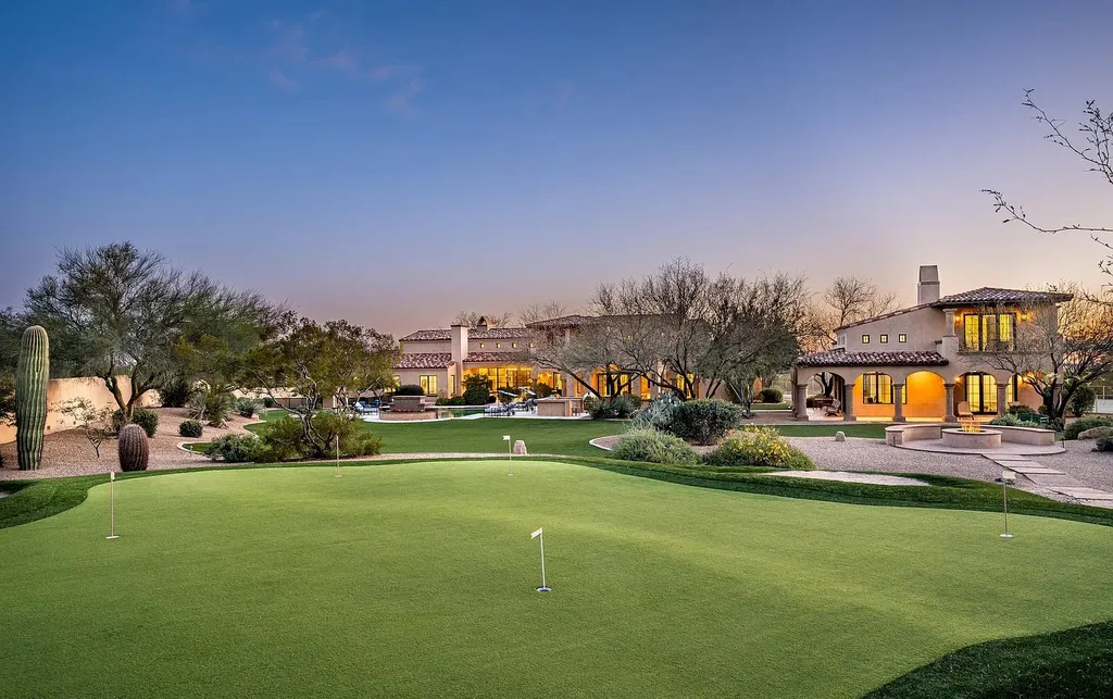 24546 North 91st Street Home in Scottsdale, Arizona. Discover the epitome of modern luxury at this renovated Modern Spanish estate in Prado Estates. Crafted by Mike Graham of American First Builders, the property showcases sweeping mountain and city views across its rare 4.7-acre lot.