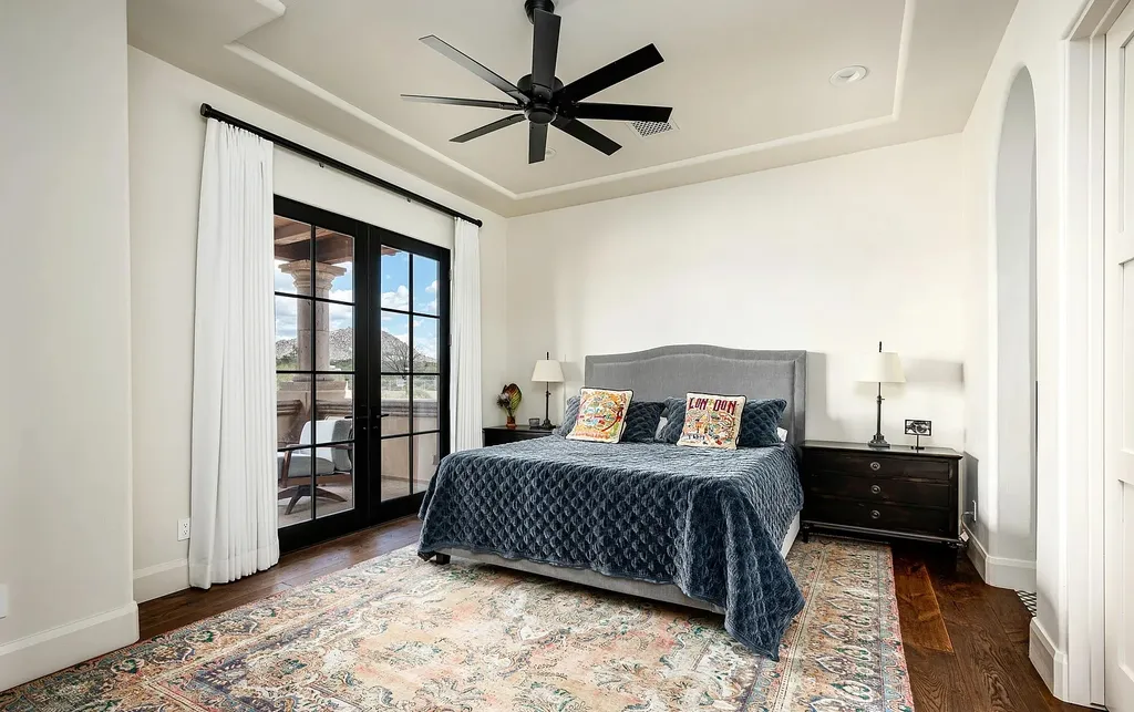 24546 North 91st Street Home in Scottsdale, Arizona. Discover the epitome of modern luxury at this renovated Modern Spanish estate in Prado Estates. Crafted by Mike Graham of American First Builders, the property showcases sweeping mountain and city views across its rare 4.7-acre lot.