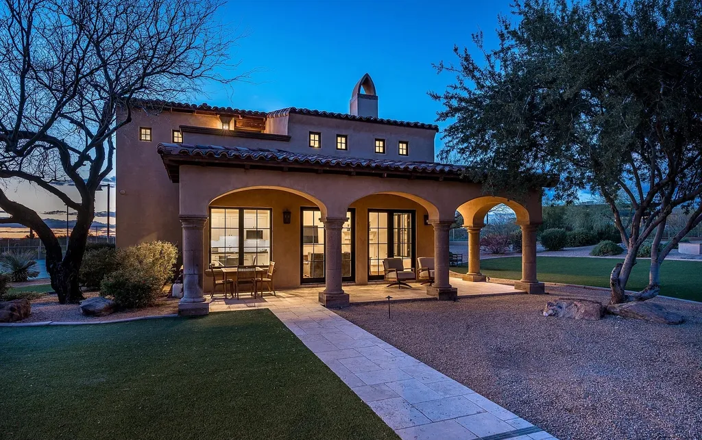 24546 North 91st Street Home in Scottsdale, Arizona. Discover the epitome of modern luxury at this renovated Modern Spanish estate in Prado Estates. Crafted by Mike Graham of American First Builders, the property showcases sweeping mountain and city views across its rare 4.7-acre lot.