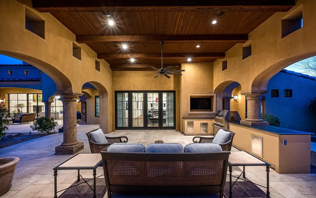24546 North 91st Street Home in Scottsdale, Arizona. Discover the epitome of modern luxury at this renovated Modern Spanish estate in Prado Estates. Crafted by Mike Graham of American First Builders, the property showcases sweeping mountain and city views across its rare 4.7-acre lot.
