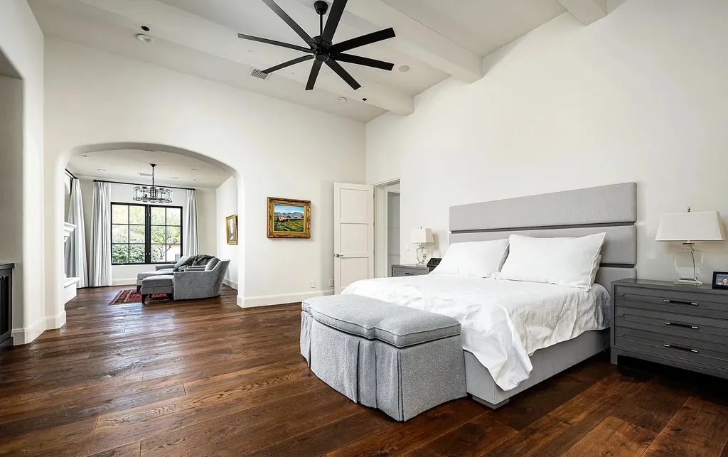 24546 North 91st Street Home in Scottsdale, Arizona. Discover the epitome of modern luxury at this renovated Modern Spanish estate in Prado Estates. Crafted by Mike Graham of American First Builders, the property showcases sweeping mountain and city views across its rare 4.7-acre lot.