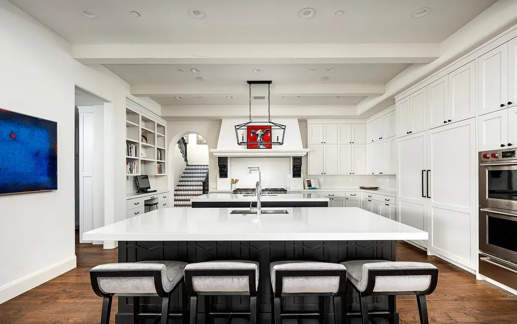 24546 North 91st Street Home in Scottsdale, Arizona. Discover the epitome of modern luxury at this renovated Modern Spanish estate in Prado Estates. Crafted by Mike Graham of American First Builders, the property showcases sweeping mountain and city views across its rare 4.7-acre lot.