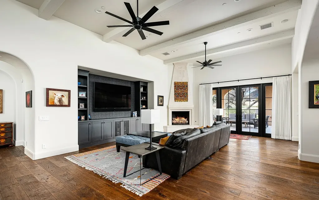 24546 North 91st Street Home in Scottsdale, Arizona. Discover the epitome of modern luxury at this renovated Modern Spanish estate in Prado Estates. Crafted by Mike Graham of American First Builders, the property showcases sweeping mountain and city views across its rare 4.7-acre lot.