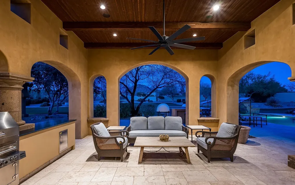 24546 North 91st Street Home in Scottsdale, Arizona. Discover the epitome of modern luxury at this renovated Modern Spanish estate in Prado Estates. Crafted by Mike Graham of American First Builders, the property showcases sweeping mountain and city views across its rare 4.7-acre lot.