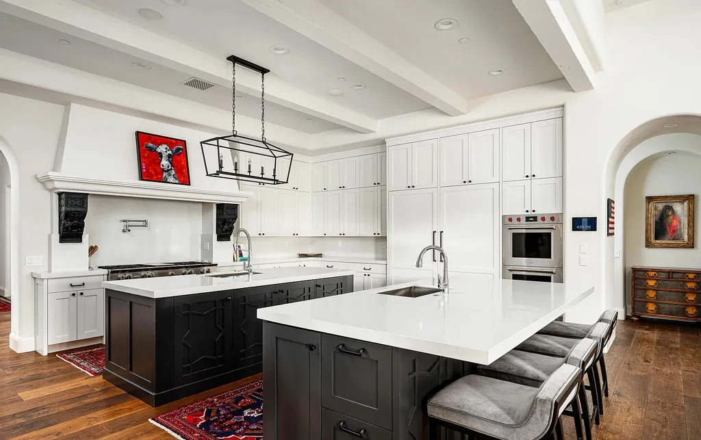 24546 North 91st Street Home in Scottsdale, Arizona. Discover the epitome of modern luxury at this renovated Modern Spanish estate in Prado Estates. Crafted by Mike Graham of American First Builders, the property showcases sweeping mountain and city views across its rare 4.7-acre lot.