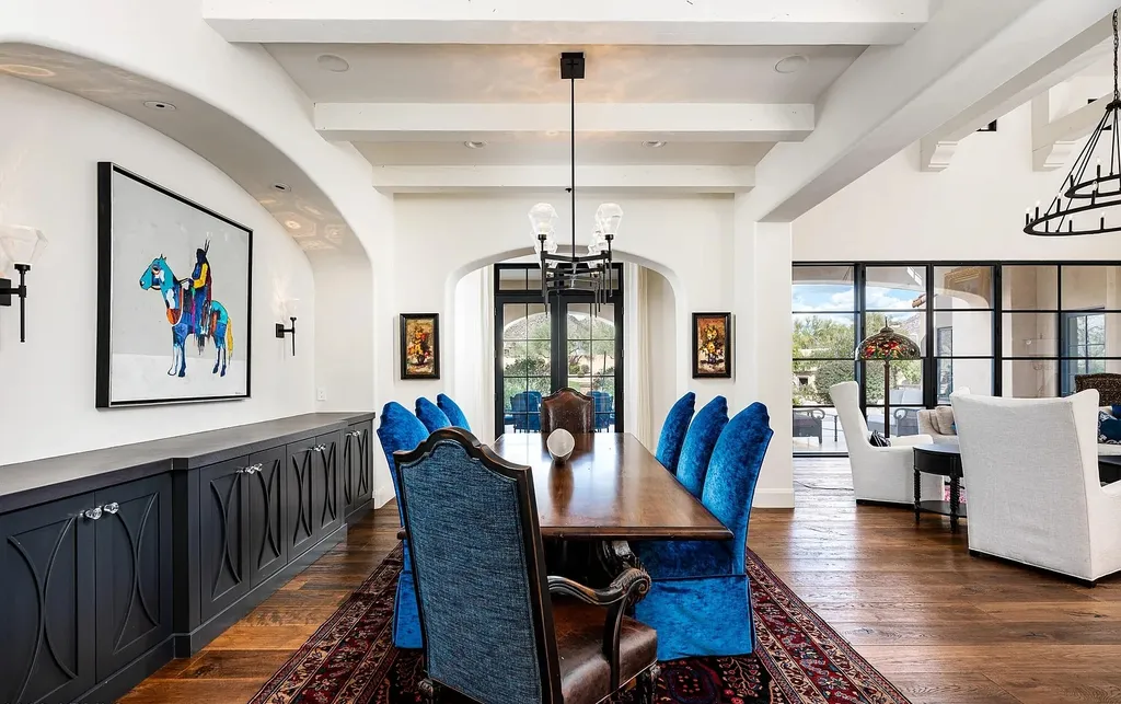 24546 North 91st Street Home in Scottsdale, Arizona. Discover the epitome of modern luxury at this renovated Modern Spanish estate in Prado Estates. Crafted by Mike Graham of American First Builders, the property showcases sweeping mountain and city views across its rare 4.7-acre lot.