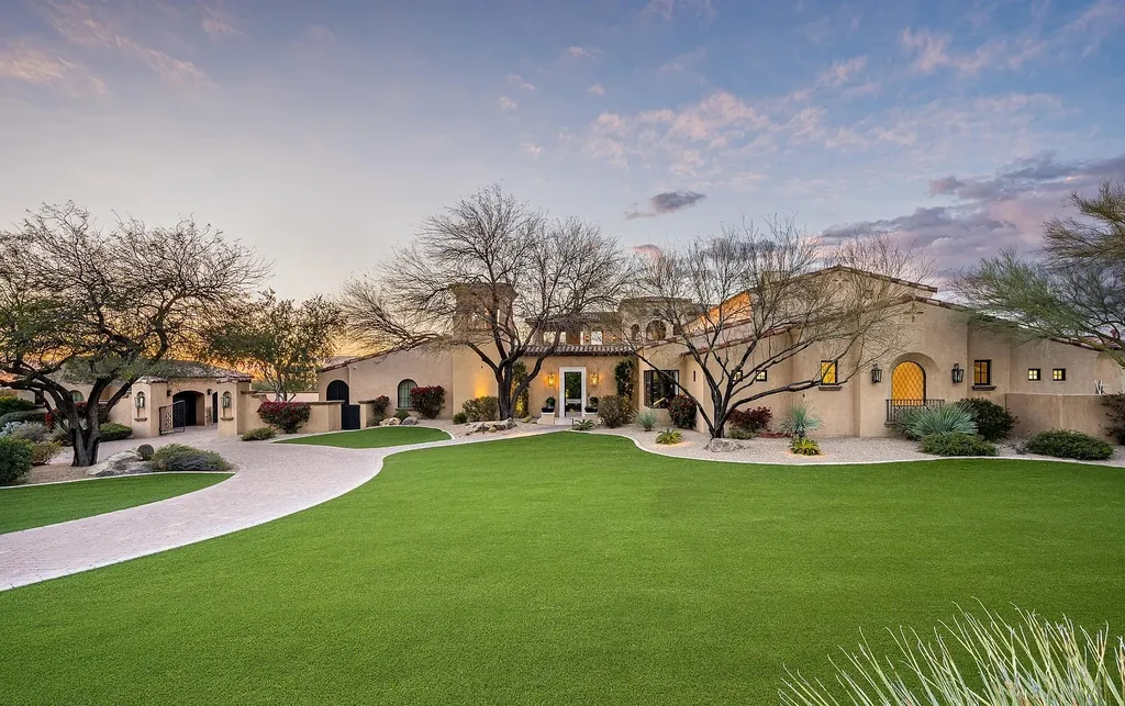 24546 North 91st Street Home in Scottsdale, Arizona. Discover the epitome of modern luxury at this renovated Modern Spanish estate in Prado Estates. Crafted by Mike Graham of American First Builders, the property showcases sweeping mountain and city views across its rare 4.7-acre lot.
