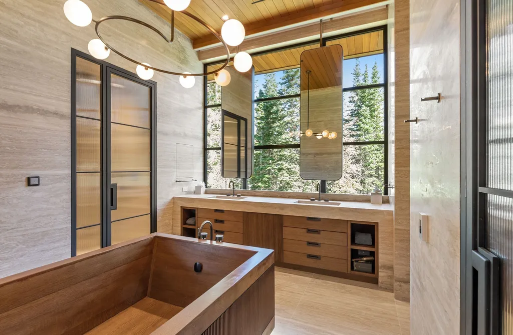 253 White Pine Canyon Road Home in Park City, Utah. Explore the unparalleled luxury of ''Monitor's Rest'', winner of the prestigious Robb Report Best of the Best award for 'Best Amenities'. Situated in the exclusive enclave of The Colony at White Pine Canyon, this ski-in/ski-out mountain masterpiece offers 5 acres of modern luxury. 