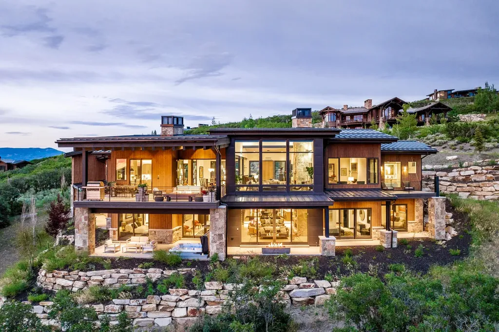 2645 E Shadow Ridge Circle Home in Heber, Utah. Experience the epitome of luxury living in the heart of Tuhaye with this stunning new build that awaits your immediate move-in. This extraordinary residence boasts a meticulously crafted and expansive floor plan, showcasing over 1,500 sqft of deck and patio spaces that invite you to savor the surrounding beauty