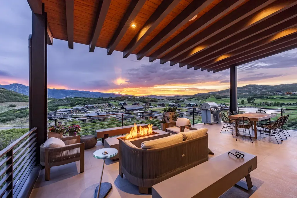 2645 E Shadow Ridge Circle Home in Heber, Utah. Experience the epitome of luxury living in the heart of Tuhaye with this stunning new build that awaits your immediate move-in. This extraordinary residence boasts a meticulously crafted and expansive floor plan, showcasing over 1,500 sqft of deck and patio spaces that invite you to savor the surrounding beauty