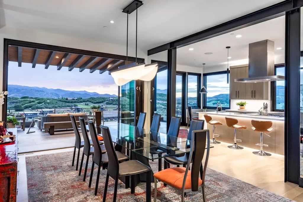 2645 E Shadow Ridge Circle Home in Heber, Utah. Experience the epitome of luxury living in the heart of Tuhaye with this stunning new build that awaits your immediate move-in. This extraordinary residence boasts a meticulously crafted and expansive floor plan, showcasing over 1,500 sqft of deck and patio spaces that invite you to savor the surrounding beauty