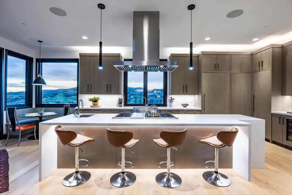 2645 E Shadow Ridge Circle Home in Heber, Utah. Experience the epitome of luxury living in the heart of Tuhaye with this stunning new build that awaits your immediate move-in. This extraordinary residence boasts a meticulously crafted and expansive floor plan, showcasing over 1,500 sqft of deck and patio spaces that invite you to savor the surrounding beauty
