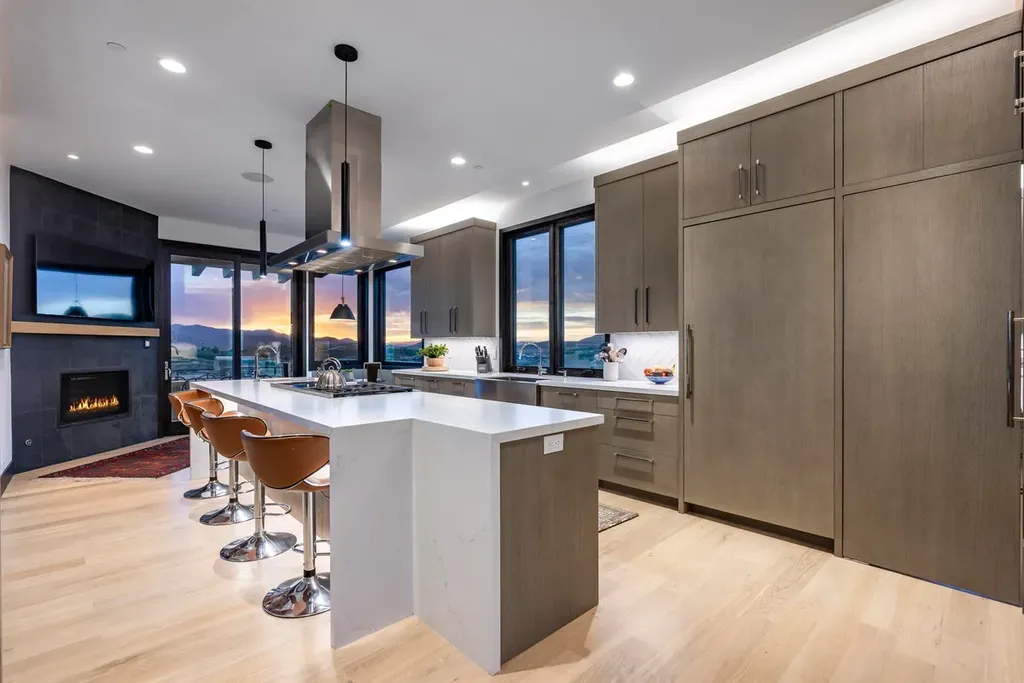 2645 E Shadow Ridge Circle Home in Heber, Utah. Experience the epitome of luxury living in the heart of Tuhaye with this stunning new build that awaits your immediate move-in. This extraordinary residence boasts a meticulously crafted and expansive floor plan, showcasing over 1,500 sqft of deck and patio spaces that invite you to savor the surrounding beauty