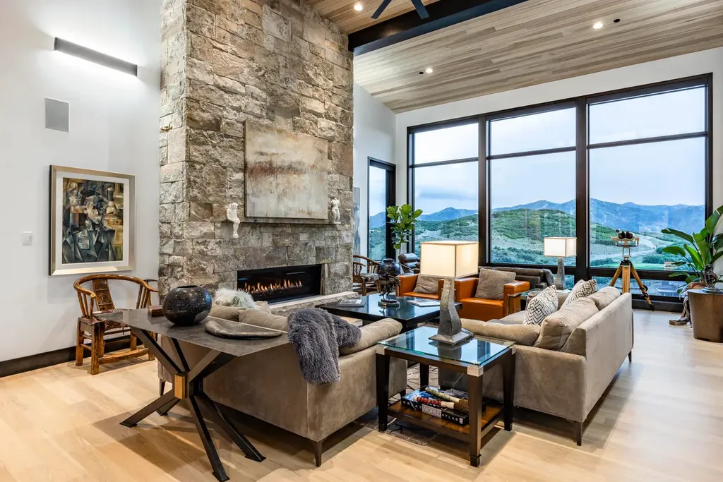 2645 E Shadow Ridge Circle Home in Heber, Utah. Experience the epitome of luxury living in the heart of Tuhaye with this stunning new build that awaits your immediate move-in. This extraordinary residence boasts a meticulously crafted and expansive floor plan, showcasing over 1,500 sqft of deck and patio spaces that invite you to savor the surrounding beauty