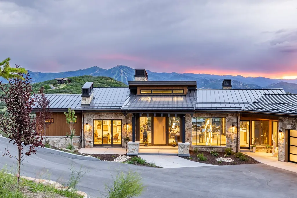 2645 E Shadow Ridge Circle Home in Heber, Utah. Experience the epitome of luxury living in the heart of Tuhaye with this stunning new build that awaits your immediate move-in. This extraordinary residence boasts a meticulously crafted and expansive floor plan, showcasing over 1,500 sqft of deck and patio spaces that invite you to savor the surrounding beauty