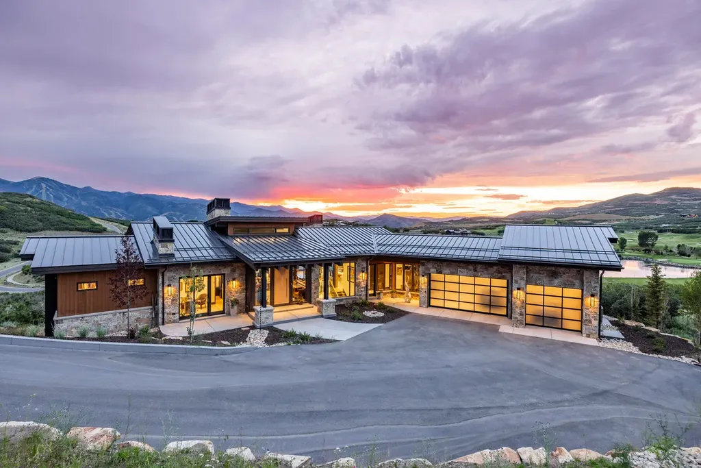 2645 E Shadow Ridge Circle Home in Heber, Utah. Experience the epitome of luxury living in the heart of Tuhaye with this stunning new build that awaits your immediate move-in. This extraordinary residence boasts a meticulously crafted and expansive floor plan, showcasing over 1,500 sqft of deck and patio spaces that invite you to savor the surrounding beauty