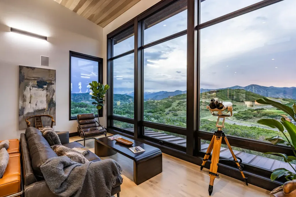 2645 E Shadow Ridge Circle Home in Heber, Utah. Experience the epitome of luxury living in the heart of Tuhaye with this stunning new build that awaits your immediate move-in. This extraordinary residence boasts a meticulously crafted and expansive floor plan, showcasing over 1,500 sqft of deck and patio spaces that invite you to savor the surrounding beauty