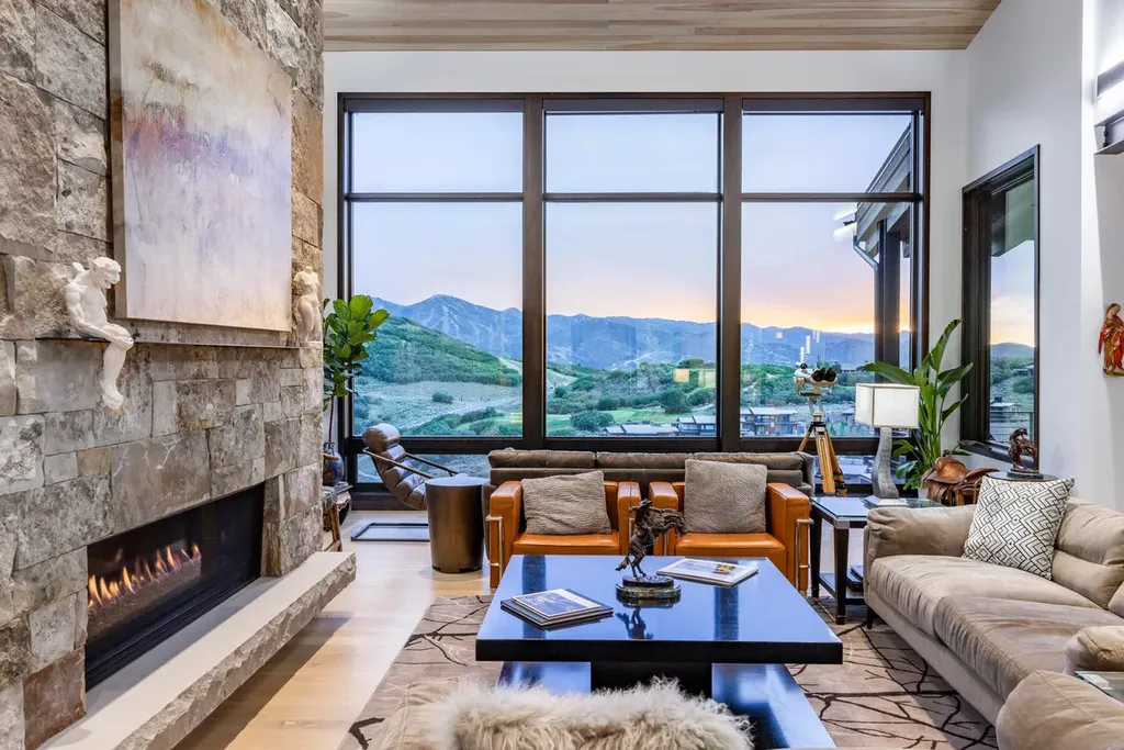 2645 E Shadow Ridge Circle Home in Heber, Utah. Experience the epitome of luxury living in the heart of Tuhaye with this stunning new build that awaits your immediate move-in. This extraordinary residence boasts a meticulously crafted and expansive floor plan, showcasing over 1,500 sqft of deck and patio spaces that invite you to savor the surrounding beauty