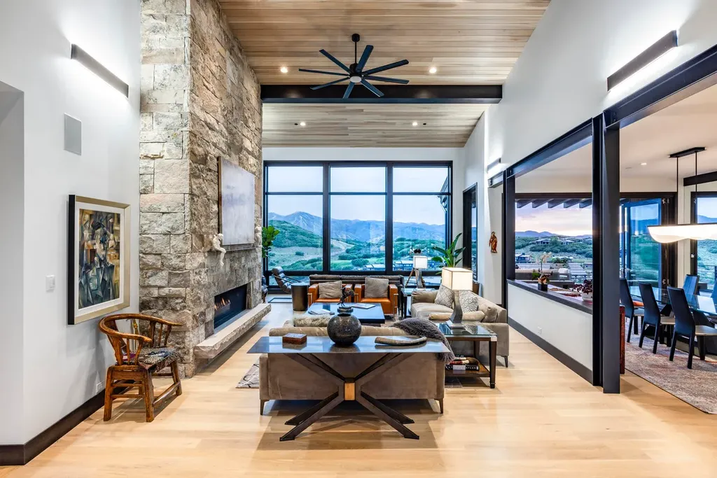 2645 E Shadow Ridge Circle Home in Heber, Utah. Experience the epitome of luxury living in the heart of Tuhaye with this stunning new build that awaits your immediate move-in. This extraordinary residence boasts a meticulously crafted and expansive floor plan, showcasing over 1,500 sqft of deck and patio spaces that invite you to savor the surrounding beauty