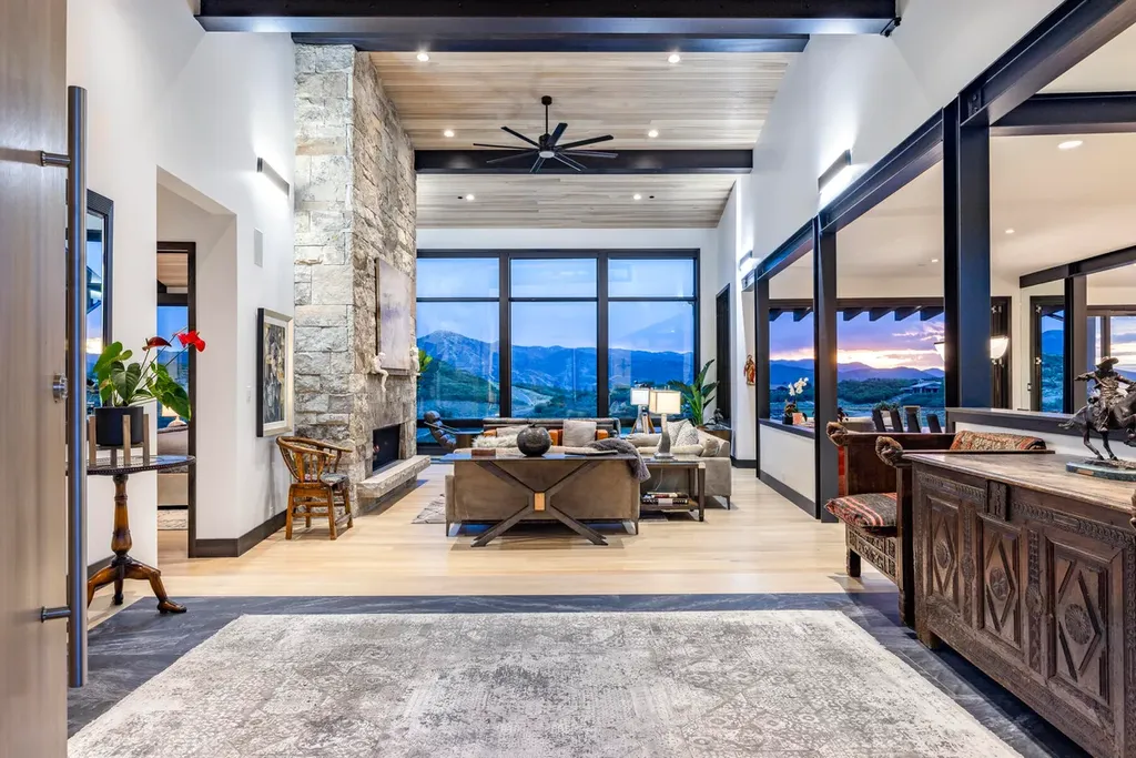 2645 E Shadow Ridge Circle Home in Heber, Utah. Experience the epitome of luxury living in the heart of Tuhaye with this stunning new build that awaits your immediate move-in. This extraordinary residence boasts a meticulously crafted and expansive floor plan, showcasing over 1,500 sqft of deck and patio spaces that invite you to savor the surrounding beauty