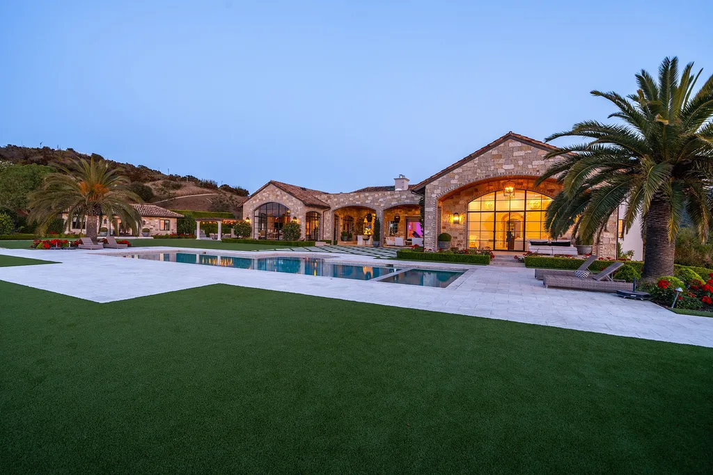 2700 White Stallion Road Home in Thousand Oaks, California. Discover the absolute crown jewel of Hidden Valley in the prestigious White Stallion Ranch gated community. This completely rebuilt Napa farmhouse sits on 22 private landscaped acres, offering breathtaking 360-degree views of city lights, mountains, and the ocean. 