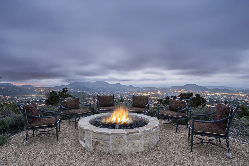 2700 White Stallion Road Home in Thousand Oaks, California. Discover the absolute crown jewel of Hidden Valley in the prestigious White Stallion Ranch gated community. This completely rebuilt Napa farmhouse sits on 22 private landscaped acres, offering breathtaking 360-degree views of city lights, mountains, and the ocean. 