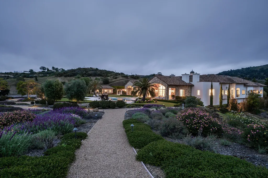 2700 White Stallion Road Home in Thousand Oaks, California. Discover the absolute crown jewel of Hidden Valley in the prestigious White Stallion Ranch gated community. This completely rebuilt Napa farmhouse sits on 22 private landscaped acres, offering breathtaking 360-degree views of city lights, mountains, and the ocean. 