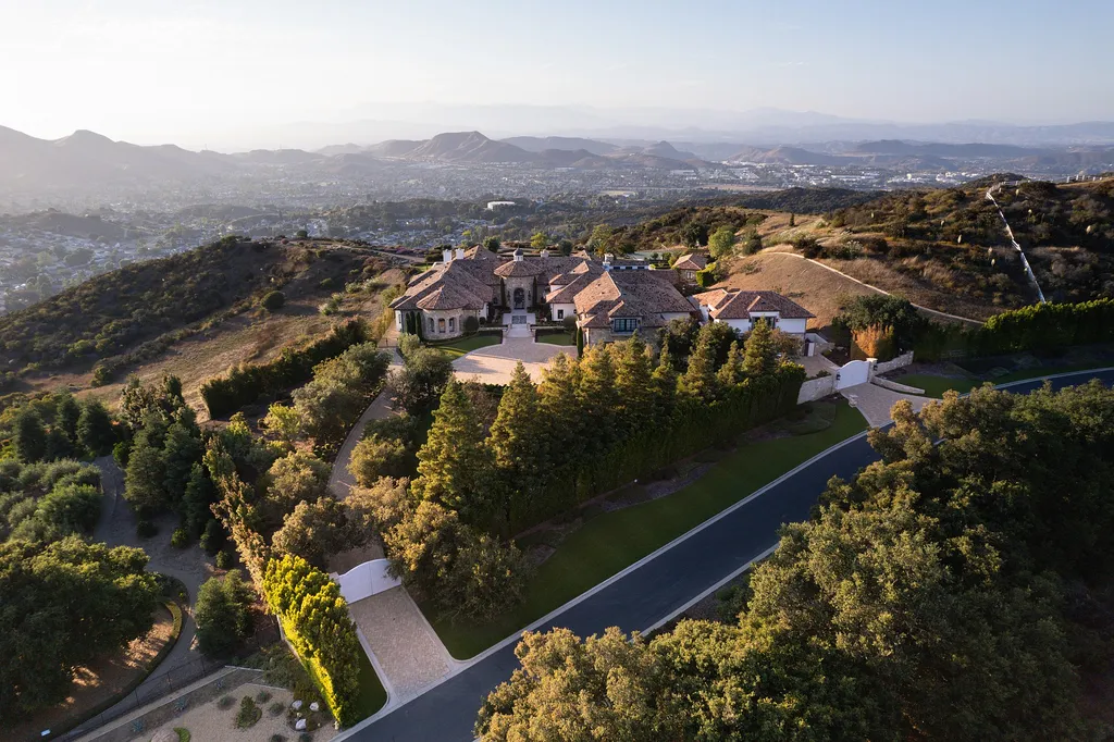 2700 White Stallion Road Home in Thousand Oaks, California. Discover the absolute crown jewel of Hidden Valley in the prestigious White Stallion Ranch gated community. This completely rebuilt Napa farmhouse sits on 22 private landscaped acres, offering breathtaking 360-degree views of city lights, mountains, and the ocean. 