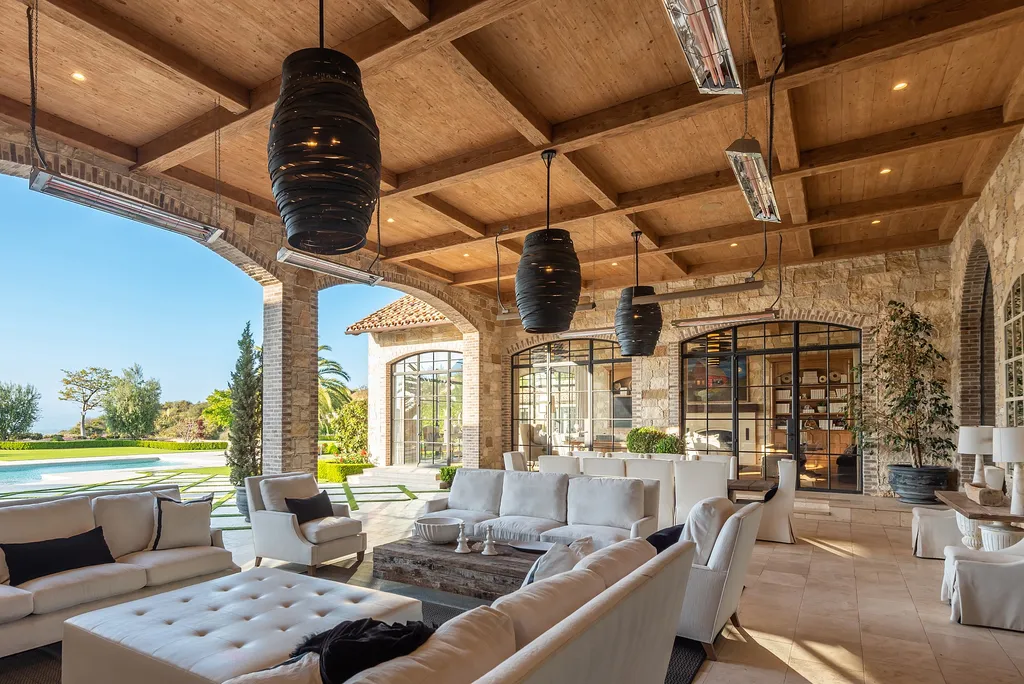 2700 White Stallion Road Home in Thousand Oaks, California. Discover the absolute crown jewel of Hidden Valley in the prestigious White Stallion Ranch gated community. This completely rebuilt Napa farmhouse sits on 22 private landscaped acres, offering breathtaking 360-degree views of city lights, mountains, and the ocean. 