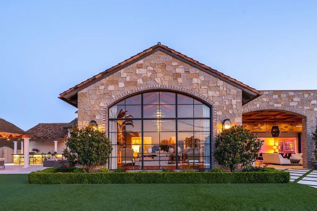 2700 White Stallion Road Home in Thousand Oaks, California. Discover the absolute crown jewel of Hidden Valley in the prestigious White Stallion Ranch gated community. This completely rebuilt Napa farmhouse sits on 22 private landscaped acres, offering breathtaking 360-degree views of city lights, mountains, and the ocean. 