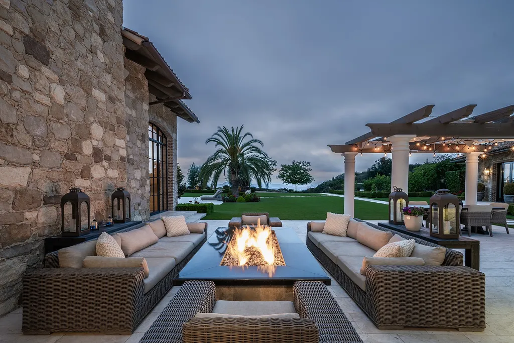 2700 White Stallion Road Home in Thousand Oaks, California. Discover the absolute crown jewel of Hidden Valley in the prestigious White Stallion Ranch gated community. This completely rebuilt Napa farmhouse sits on 22 private landscaped acres, offering breathtaking 360-degree views of city lights, mountains, and the ocean. 