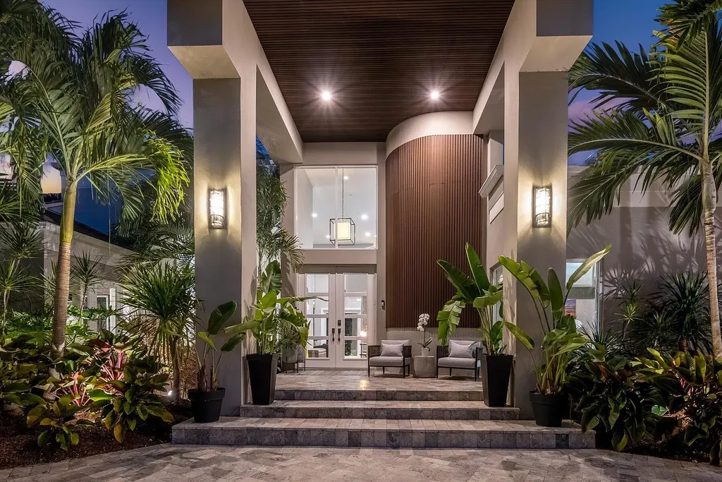 2770 Long Meadow Drive Home in Wellington, Florida. Recently renovated with high-end finishes, this home exudes elegance and sophistication. The interior is tastefully decorated, creating a warm and inviting atmosphere with meticulous attention to detail. There are plenty of different spaces to gather with family and friends, making it perfect for entertaining.
