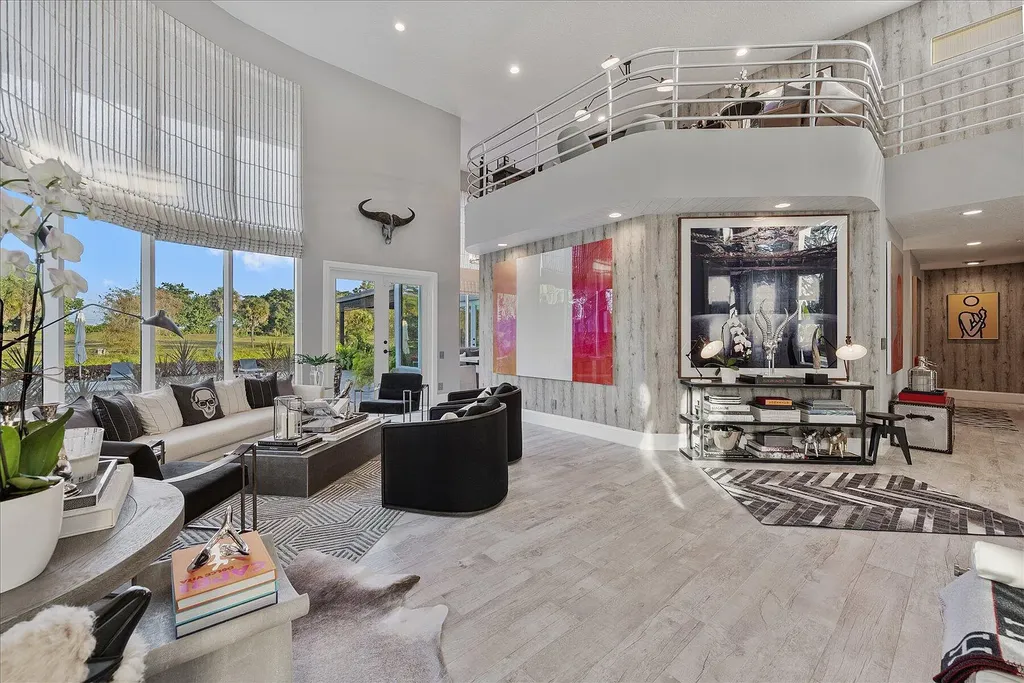 2770 Long Meadow Drive Home in Wellington, Florida. Recently renovated with high-end finishes, this home exudes elegance and sophistication. The interior is tastefully decorated, creating a warm and inviting atmosphere with meticulous attention to detail. There are plenty of different spaces to gather with family and friends, making it perfect for entertaining.