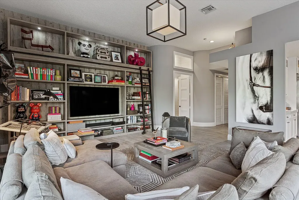 2770 Long Meadow Drive Home in Wellington, Florida. Recently renovated with high-end finishes, this home exudes elegance and sophistication. The interior is tastefully decorated, creating a warm and inviting atmosphere with meticulous attention to detail. There are plenty of different spaces to gather with family and friends, making it perfect for entertaining.