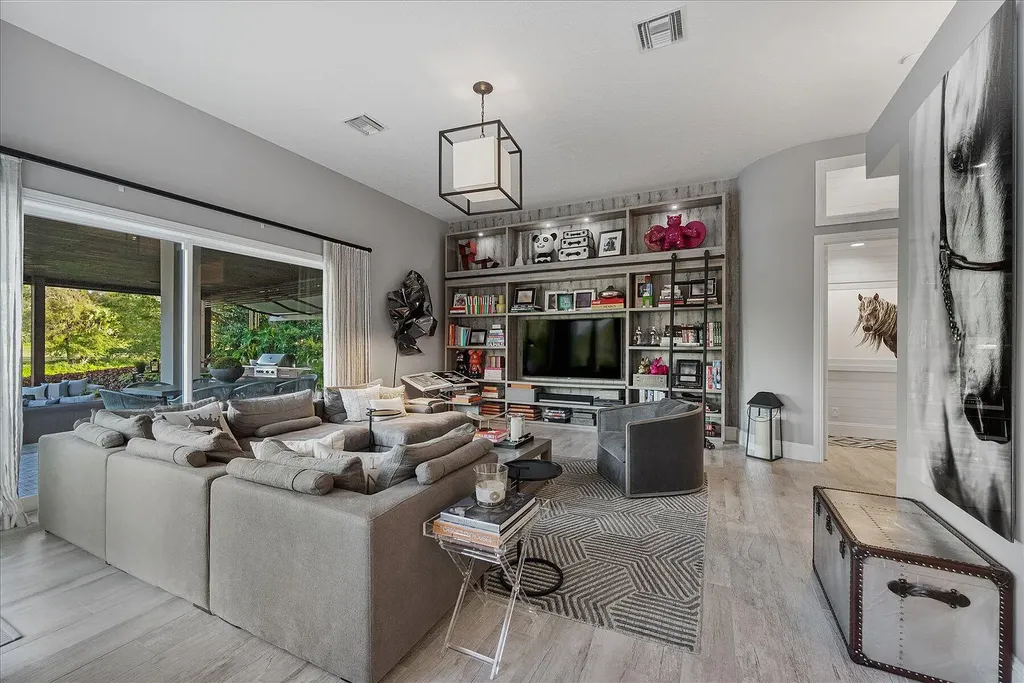 2770 Long Meadow Drive Home in Wellington, Florida. Recently renovated with high-end finishes, this home exudes elegance and sophistication. The interior is tastefully decorated, creating a warm and inviting atmosphere with meticulous attention to detail. There are plenty of different spaces to gather with family and friends, making it perfect for entertaining.