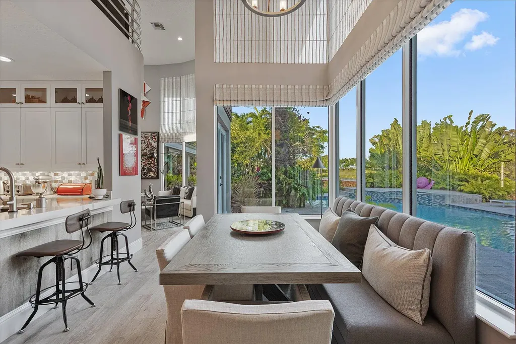 2770 Long Meadow Drive Home in Wellington, Florida. Recently renovated with high-end finishes, this home exudes elegance and sophistication. The interior is tastefully decorated, creating a warm and inviting atmosphere with meticulous attention to detail. There are plenty of different spaces to gather with family and friends, making it perfect for entertaining.