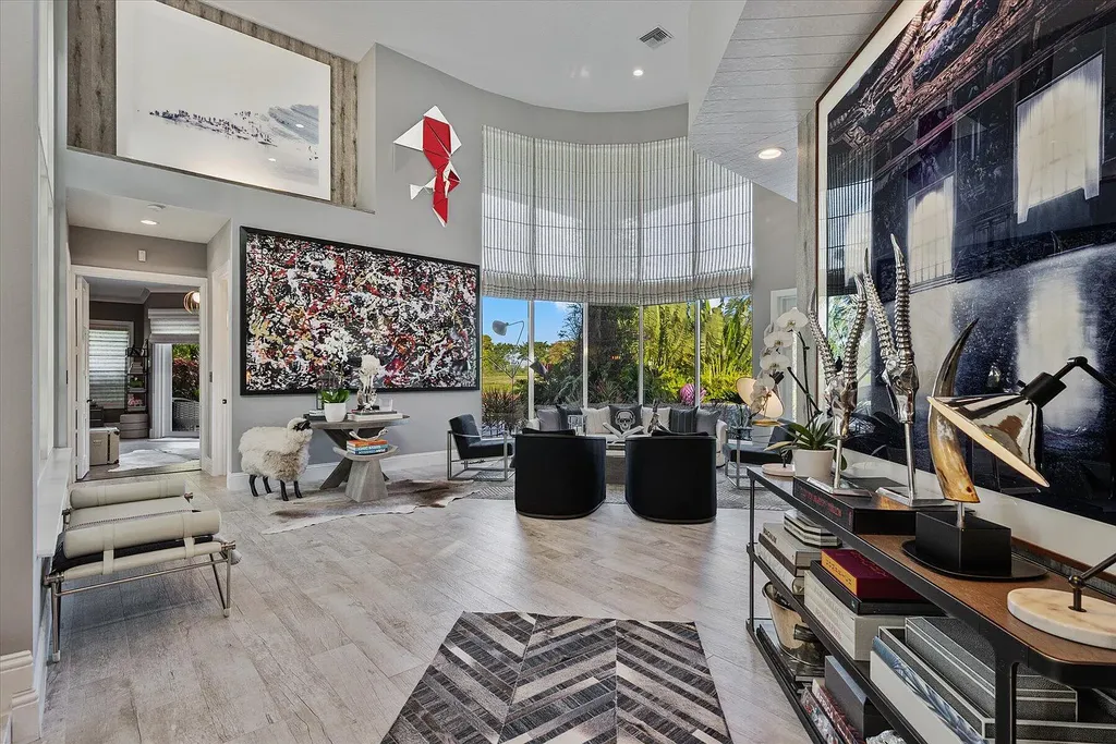 2770 Long Meadow Drive Home in Wellington, Florida. Recently renovated with high-end finishes, this home exudes elegance and sophistication. The interior is tastefully decorated, creating a warm and inviting atmosphere with meticulous attention to detail. There are plenty of different spaces to gather with family and friends, making it perfect for entertaining.