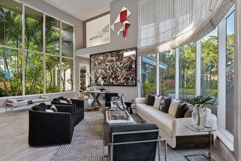 2770 Long Meadow Drive Home in Wellington, Florida. Recently renovated with high-end finishes, this home exudes elegance and sophistication. The interior is tastefully decorated, creating a warm and inviting atmosphere with meticulous attention to detail. There are plenty of different spaces to gather with family and friends, making it perfect for entertaining.