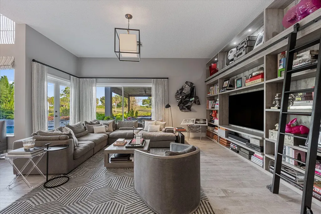 2770 Long Meadow Drive Home in Wellington, Florida. Recently renovated with high-end finishes, this home exudes elegance and sophistication. The interior is tastefully decorated, creating a warm and inviting atmosphere with meticulous attention to detail. There are plenty of different spaces to gather with family and friends, making it perfect for entertaining.