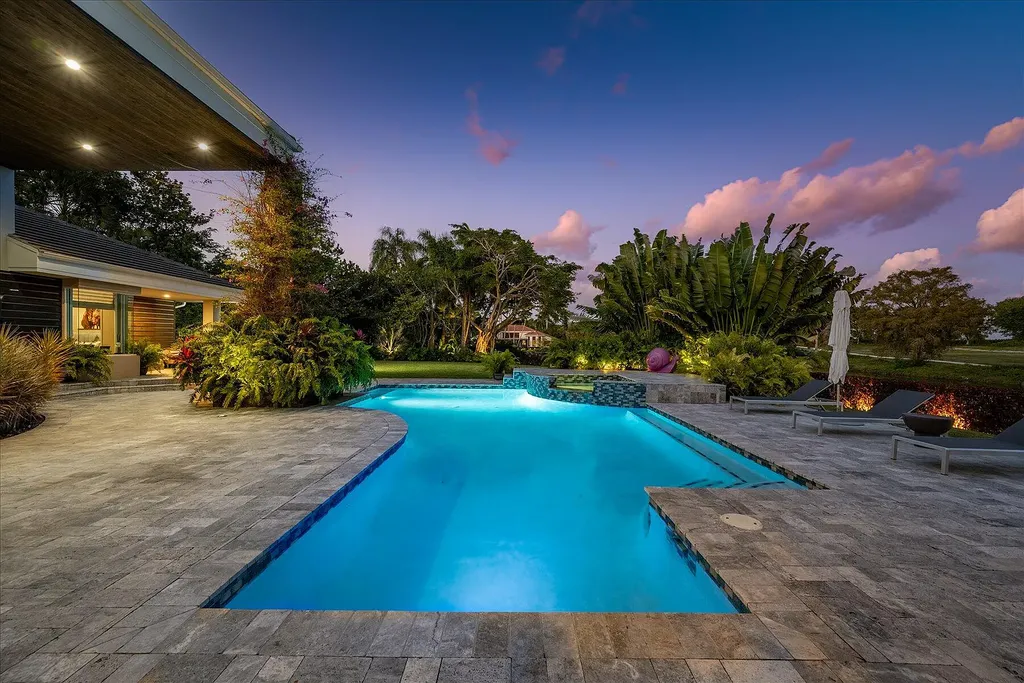 2770 Long Meadow Drive Home in Wellington, Florida. Recently renovated with high-end finishes, this home exudes elegance and sophistication. The interior is tastefully decorated, creating a warm and inviting atmosphere with meticulous attention to detail. There are plenty of different spaces to gather with family and friends, making it perfect for entertaining.