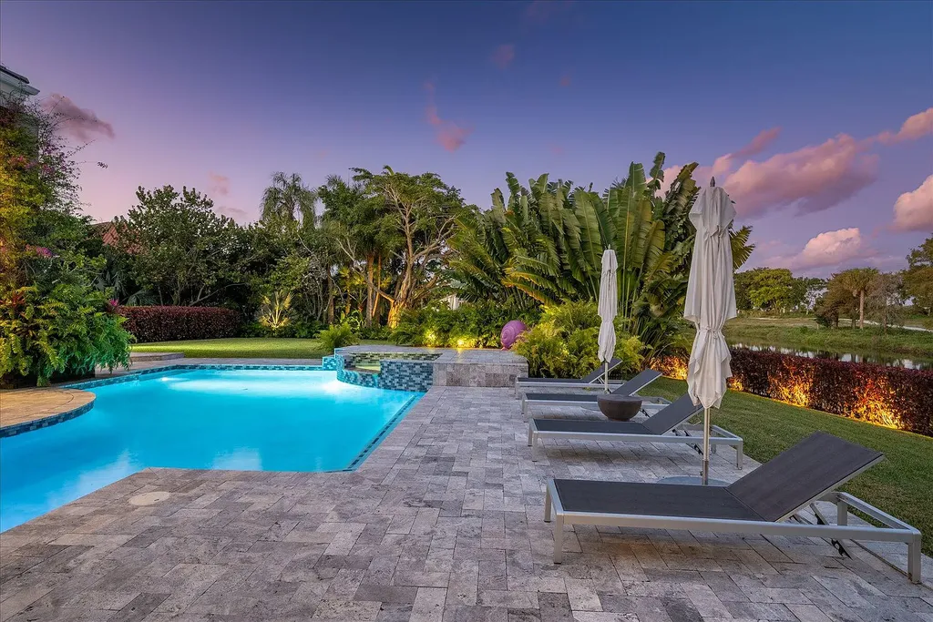 2770 Long Meadow Drive Home in Wellington, Florida. Recently renovated with high-end finishes, this home exudes elegance and sophistication. The interior is tastefully decorated, creating a warm and inviting atmosphere with meticulous attention to detail. There are plenty of different spaces to gather with family and friends, making it perfect for entertaining.
