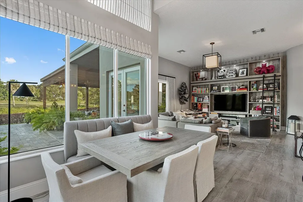 2770 Long Meadow Drive Home in Wellington, Florida. Recently renovated with high-end finishes, this home exudes elegance and sophistication. The interior is tastefully decorated, creating a warm and inviting atmosphere with meticulous attention to detail. There are plenty of different spaces to gather with family and friends, making it perfect for entertaining.