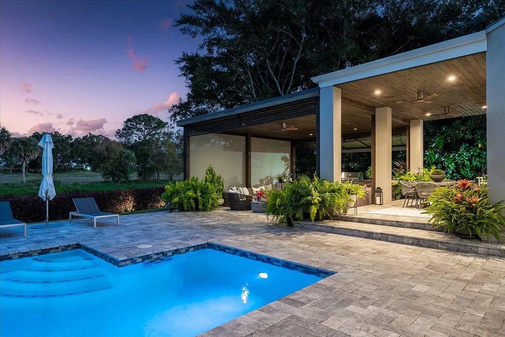 2770 Long Meadow Drive Home in Wellington, Florida. Recently renovated with high-end finishes, this home exudes elegance and sophistication. The interior is tastefully decorated, creating a warm and inviting atmosphere with meticulous attention to detail. There are plenty of different spaces to gather with family and friends, making it perfect for entertaining.