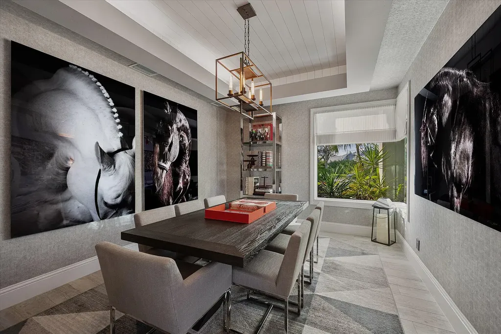 2770 Long Meadow Drive Home in Wellington, Florida. Recently renovated with high-end finishes, this home exudes elegance and sophistication. The interior is tastefully decorated, creating a warm and inviting atmosphere with meticulous attention to detail. There are plenty of different spaces to gather with family and friends, making it perfect for entertaining.