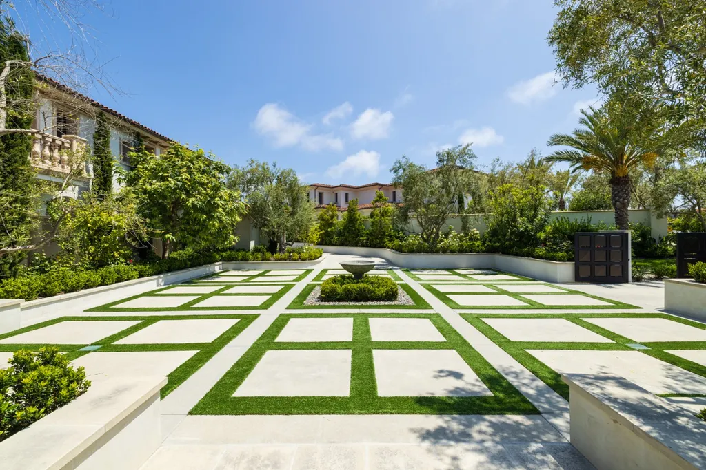28 Tide Watch Home in Newport Beach, California. Discover the epitome of modern luxury in the prestigious Crystal Cove community. This sophisticated custom-built home boasts sweeping ocean and mountain views, six bedrooms, eight baths, and state-of-the-art technology. Impeccable craftsmanship and high-end finishes are complemented by spacious entertainment areas, indoor/outdoor living, and a stunning backyard with a pool, spa, and alfresco dining options.