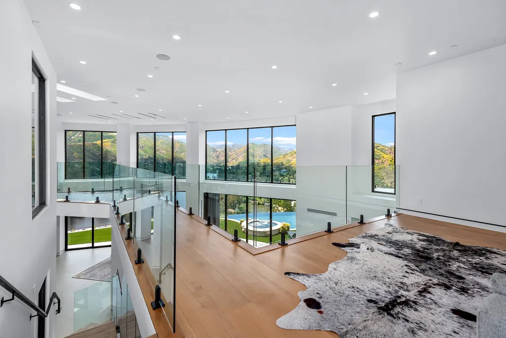 28888 Lake Vista Drive Home in Agoura Hills, California. Welcome to the exclusive ''Lake Vista Estate'' in Malibou Lake, offering a one-of-a-kind trophy masterpiece with breathtaking jet liner views unmatched in Southern California. This brand new European Contemporary home, designed by GoDesign21, features over 6500 square feet of luxurious living space on 3.41 acres of complete privacy in the Santa Monica mountains. 