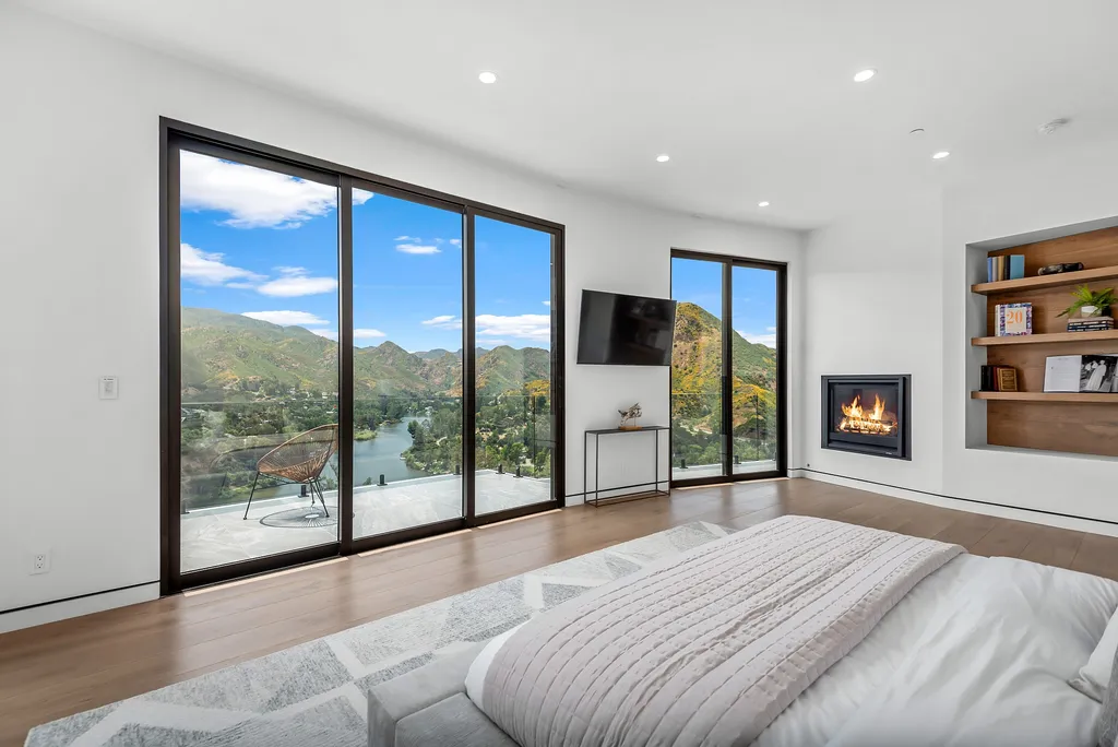 28888 Lake Vista Drive Home in Agoura Hills, California. Welcome to the exclusive ''Lake Vista Estate'' in Malibou Lake, offering a one-of-a-kind trophy masterpiece with breathtaking jet liner views unmatched in Southern California. This brand new European Contemporary home, designed by GoDesign21, features over 6500 square feet of luxurious living space on 3.41 acres of complete privacy in the Santa Monica mountains. 