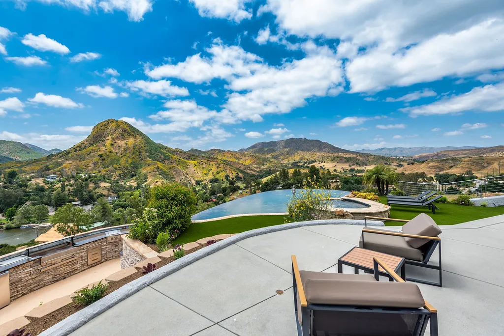 28888 Lake Vista Drive Home in Agoura Hills, California. Welcome to the exclusive ''Lake Vista Estate'' in Malibou Lake, offering a one-of-a-kind trophy masterpiece with breathtaking jet liner views unmatched in Southern California. This brand new European Contemporary home, designed by GoDesign21, features over 6500 square feet of luxurious living space on 3.41 acres of complete privacy in the Santa Monica mountains. 