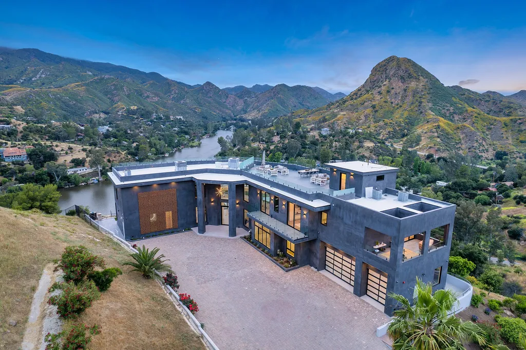 28888 Lake Vista Drive Home in Agoura Hills, California. Welcome to the exclusive ''Lake Vista Estate'' in Malibou Lake, offering a one-of-a-kind trophy masterpiece with breathtaking jet liner views unmatched in Southern California. This brand new European Contemporary home, designed by GoDesign21, features over 6500 square feet of luxurious living space on 3.41 acres of complete privacy in the Santa Monica mountains. 