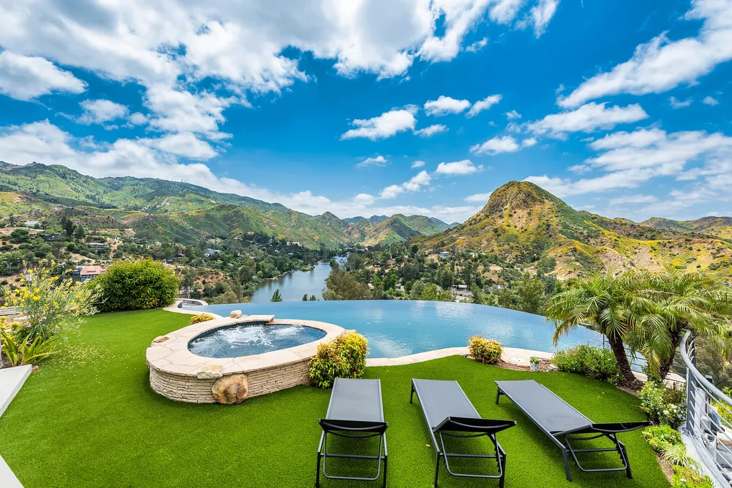 28888 Lake Vista Drive Home in Agoura Hills, California. Welcome to the exclusive ''Lake Vista Estate'' in Malibou Lake, offering a one-of-a-kind trophy masterpiece with breathtaking jet liner views unmatched in Southern California. This brand new European Contemporary home, designed by GoDesign21, features over 6500 square feet of luxurious living space on 3.41 acres of complete privacy in the Santa Monica mountains. 